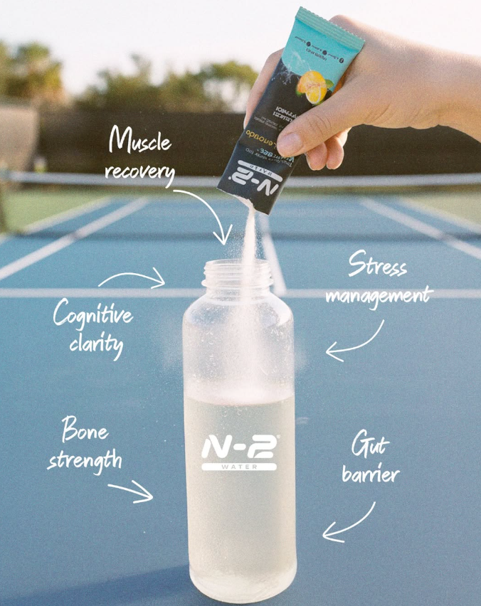 N-2 stick poured into a water bottle courtside
